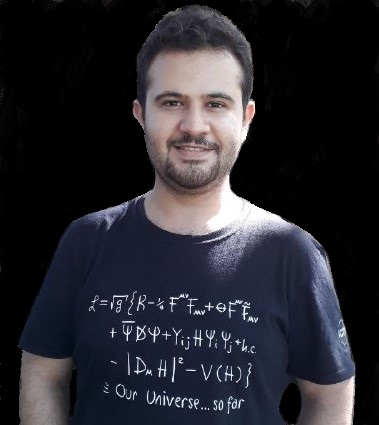 Javad Ebadi image with ICTP shirt with a physics formula